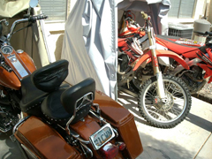 Double dirt bike bike barn cover and a harley road king