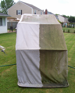 Use pressure washer on motorcycle cover to remove mildew and dirt